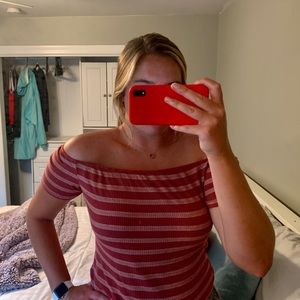 Off the shoulder striped shirt.